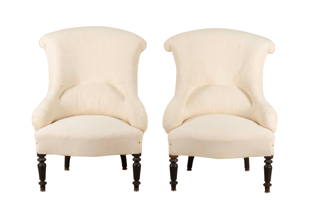 Pair of charming 19th Century French Napoleon III slipper chairs with gently curved scroll backs.