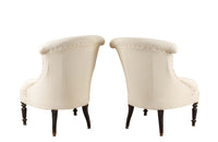 Pair of charming 19th Century French Napoleon III slipper chairs with gently curved scroll backs.