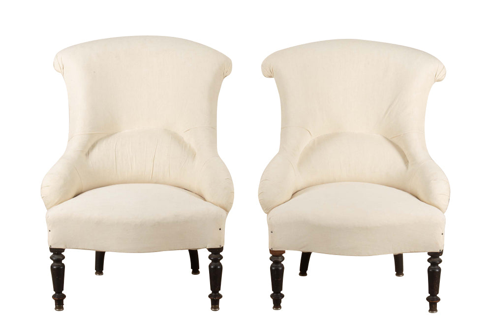 Pair of charming 19th Century French Napoleon III slipper chairs with gently curved scroll backs.