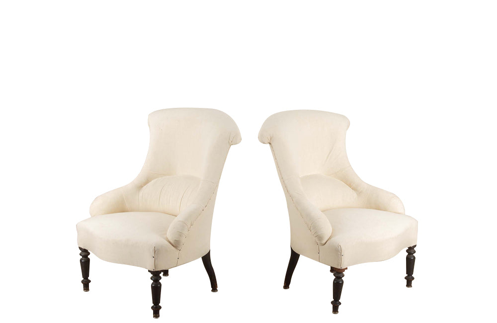 Pair of charming 19th Century French Napoleon III slipper chairs with gently curved scroll backs.