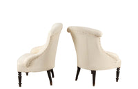 Pair of charming 19th Century French Napoleon III slipper chairs with gently curved scroll backs.