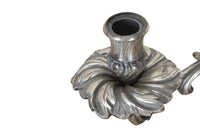 Pair of late 19th Century French worn silver plated candleabras in the Rococo style.