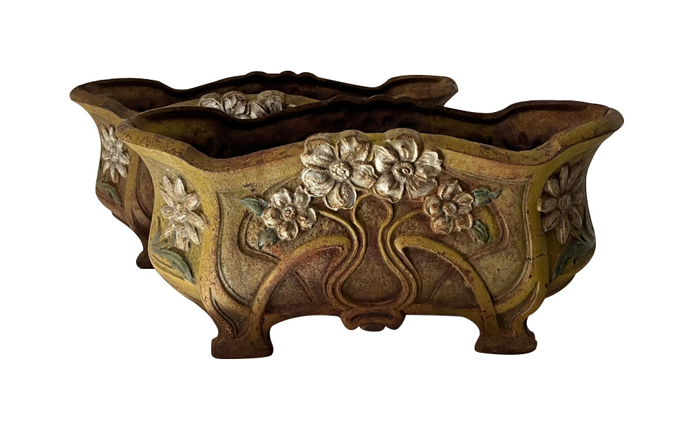 Pair of late 19th Century French  Art Nouveau polychrome cast iron jardinieres.