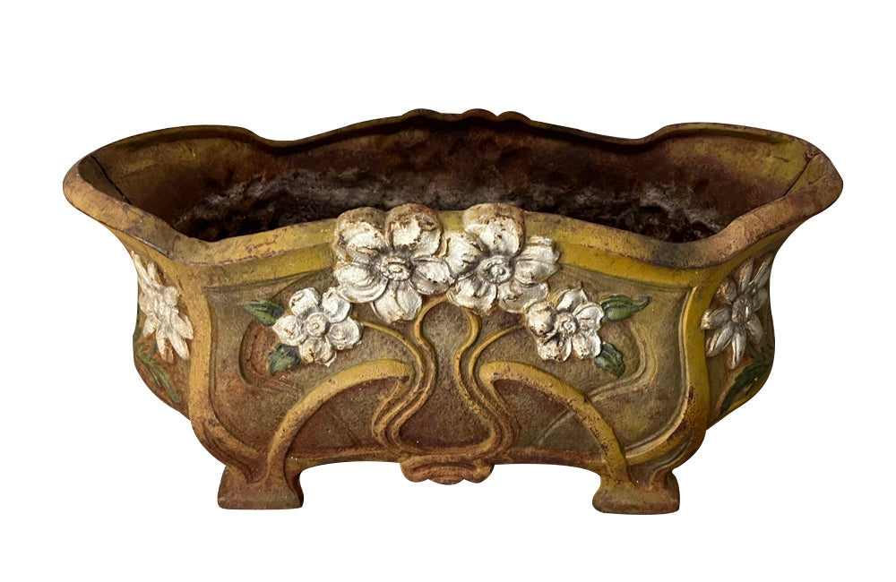 Pair of late 19th Century French  Art Nouveau polychrome cast iron jardinieres.