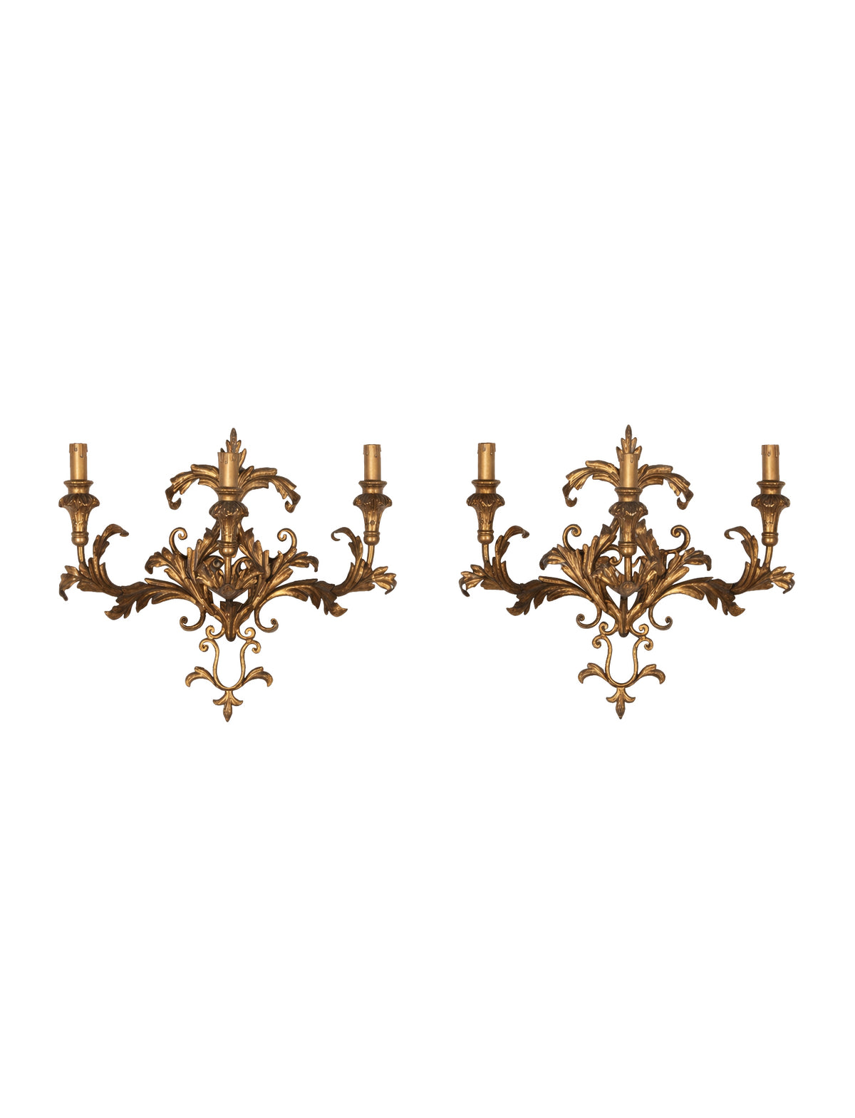 A decorative and elegant pair of 20th Century Italian gilt tole and wood wall lights.