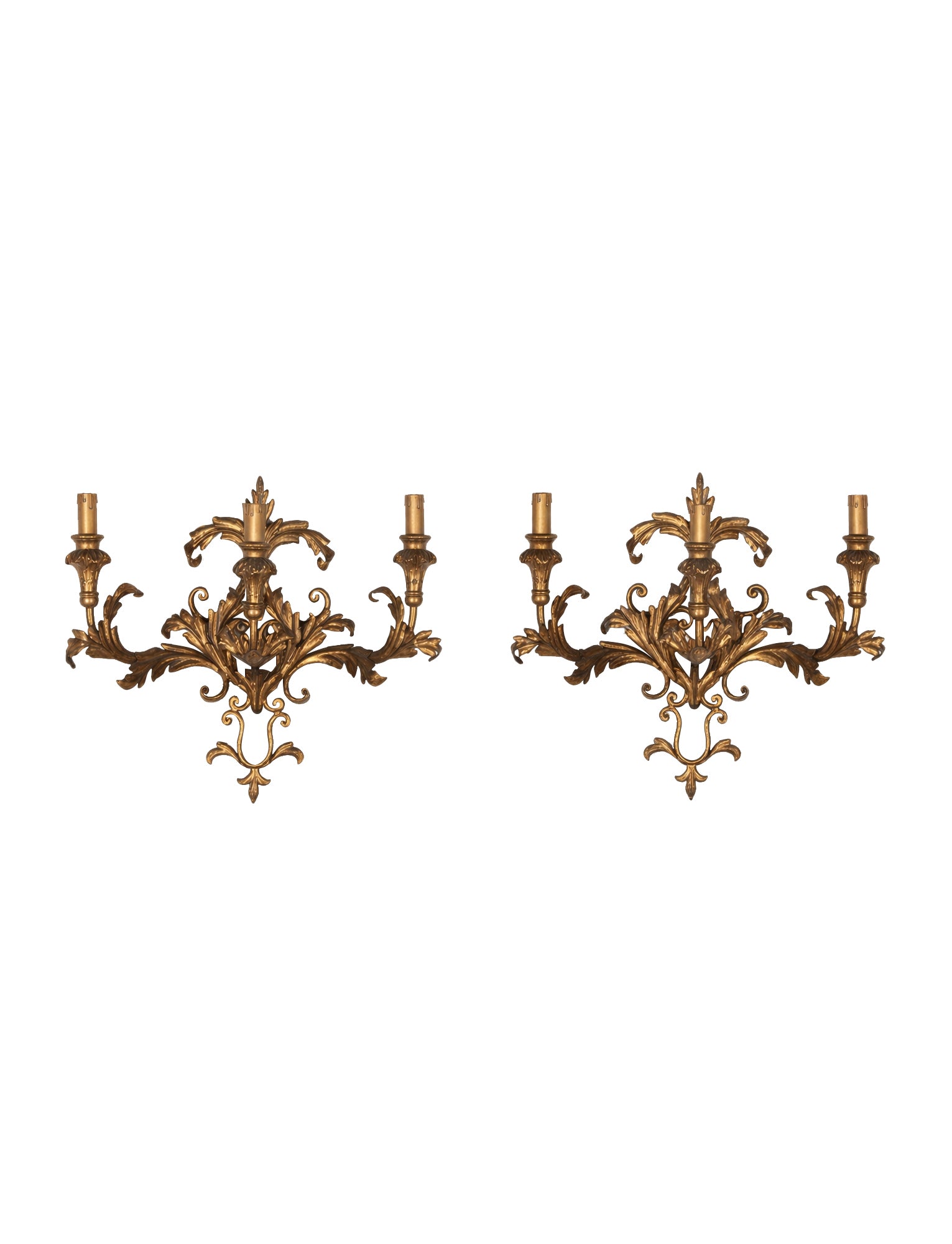 A decorative and elegant pair of 20th Century Italian gilt tole and wood wall lights.