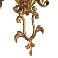 A decorative and elegant pair of 20th Century Italian gilt tole and wood wall lights.