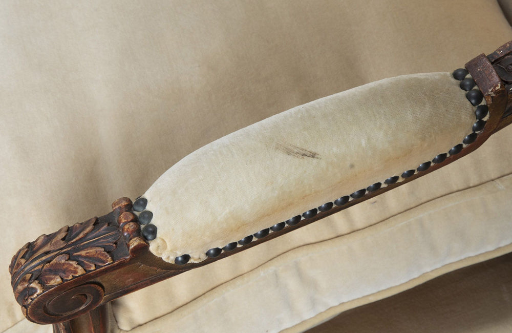 Pair of early 20th Century French Louis XVI Revival open armchairs in the Neo-Classical style.