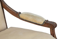 Pair of early 20th Century French Louis XVI Revival open armchairs in the Neo-Classical style.