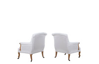 Late 19th century pair of  large French giltwood armchairs in the Louis XV style on casters.