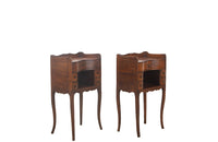 Pair of early 20th century french  walnut chevets in the Louis XV style with each end table having a galbé front with 5 drawers and a recessed shelf.