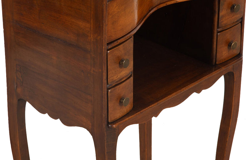 Pair of early 20th century french  walnut chevets in the Louis XV style with each end table having a galbé front with 5 drawers and a recessed shelf.