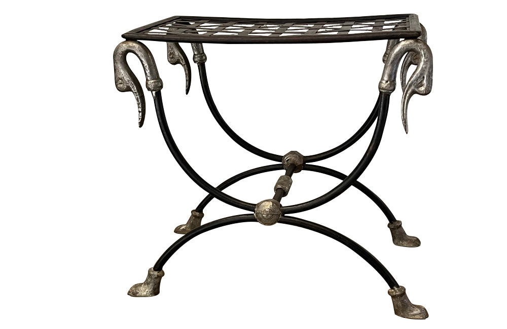Pair of elegant Mid-Century French wrought iron curule stools attributed to Maison Jansen