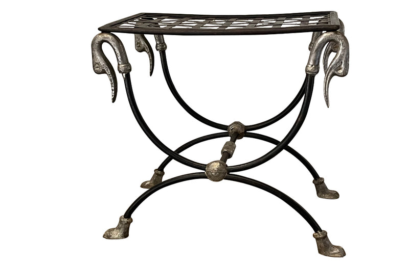 Pair of elegant Mid-Century French wrought iron curule stools attributed to Maison Jansen