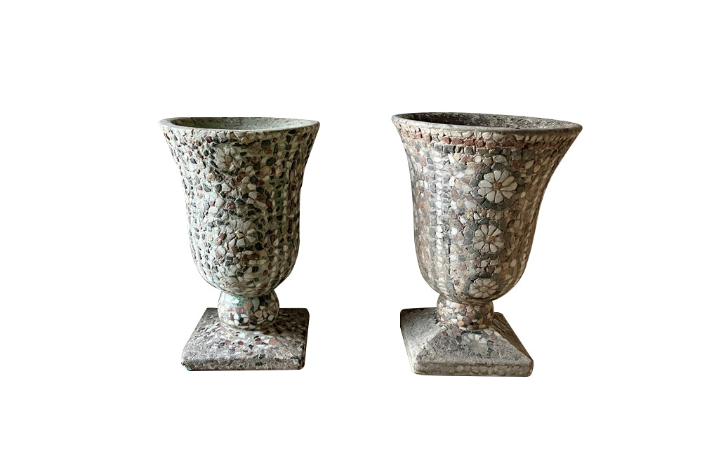 Decorative near pair of 20th Century French pebble mosaic planters.