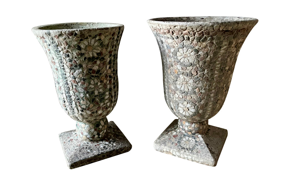 Decorative near pair of 20th Century French pebble mosaic planters.