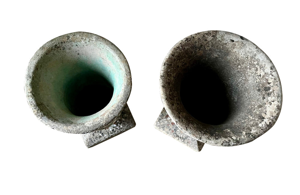 Decorative near pair of 20th Century French pebble mosaic planters.