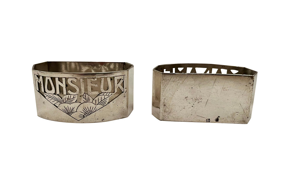 Stylish pair of 20th Century French Art Deco silver plate napkin rings.