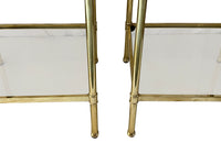 Pair of Mid-Century Italian square brass end tables with glass shelves.