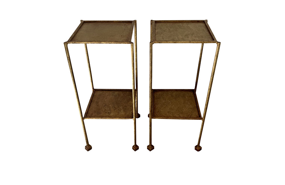Elegant mid century pair of Spanish side tables crafted in gilt iron.