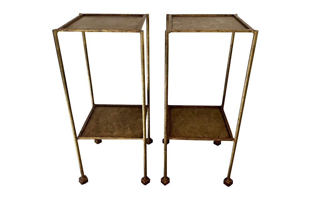 Elegant mid century pair of Spanish side tables crafted in gilt iron.