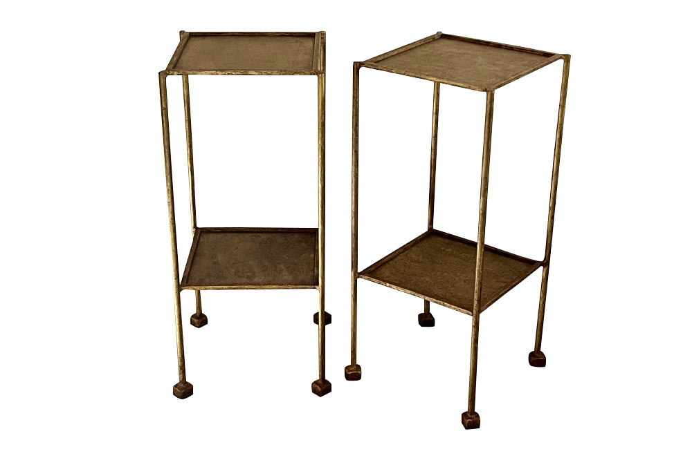 Elegant mid century pair of Spanish side tables crafted in gilt iron.
