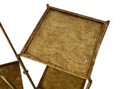 Elegant mid century pair of Spanish side tables crafted in gilt iron.