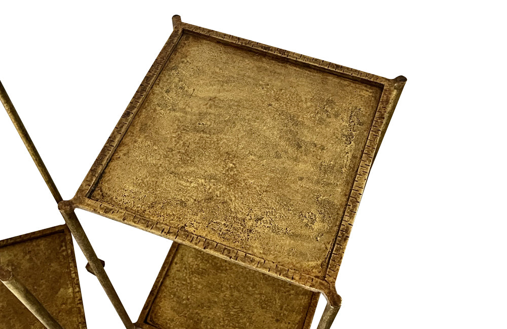 Elegant mid century pair of Spanish side tables crafted in gilt iron.