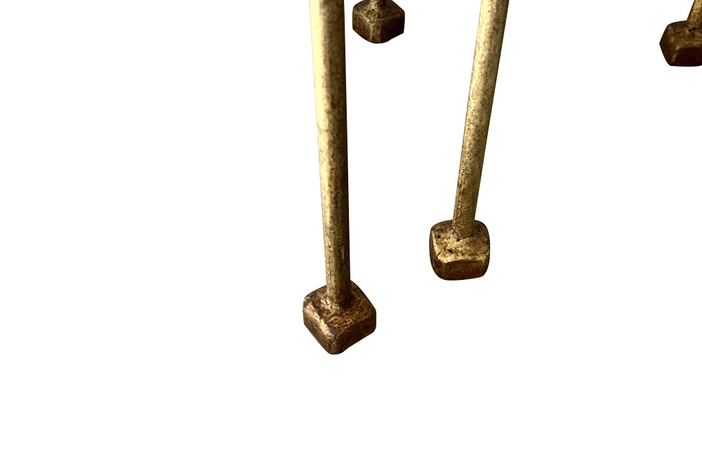 Elegant mid century pair of Spanish side tables crafted in gilt iron.