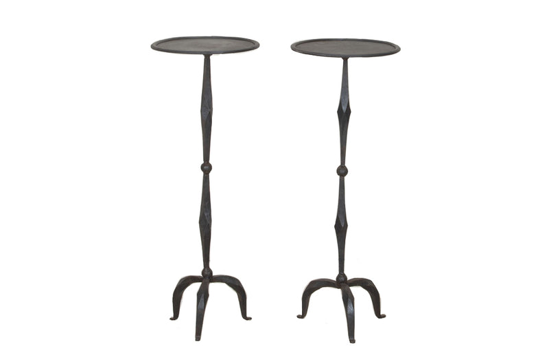 Pair of 20th Century Spanish hand wrought iron round top occasional or pedestal tables.