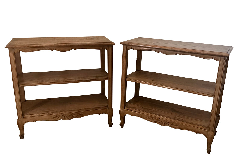 Mid 20th Century oak shelves in the Louis XV revival style with carved details. French antique furniture