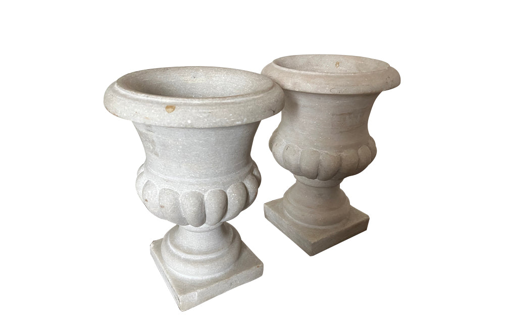 Pair of late 19th century elegant white marble Medici urns