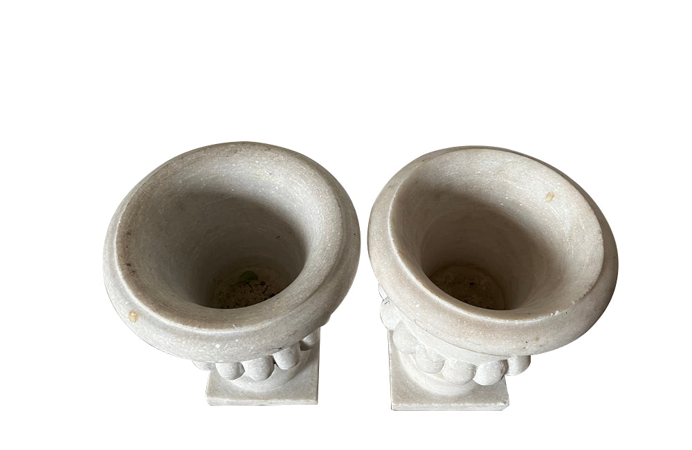 Pair of late 19th century elegant white marble Medici urns