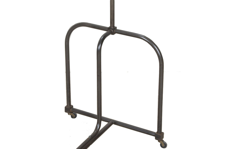 Fabulous near pair of 20th Century French iron clothes rails.