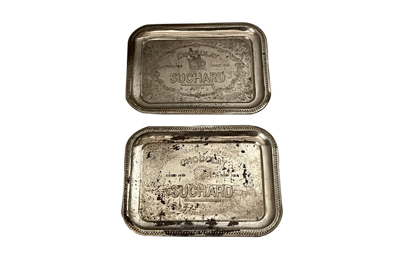 PAIR OF EARLY 20TH CENTURY 'SUCHARD' CHOCOLATE ADVERTISING TRAYS