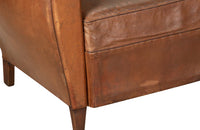 Elegant pair of small leather 20th Century French club chairs.