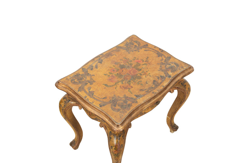 Pair of charming early 20th century painted, Italian, end tables with painted floral decoration in the Venetian style.