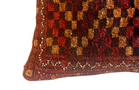 Vintage feather-filled Persian carpet cushion back with antique linen.