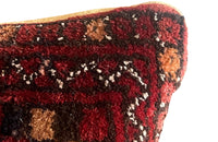 Vintage feather-filled Persian carpet cushion back with antique linen.