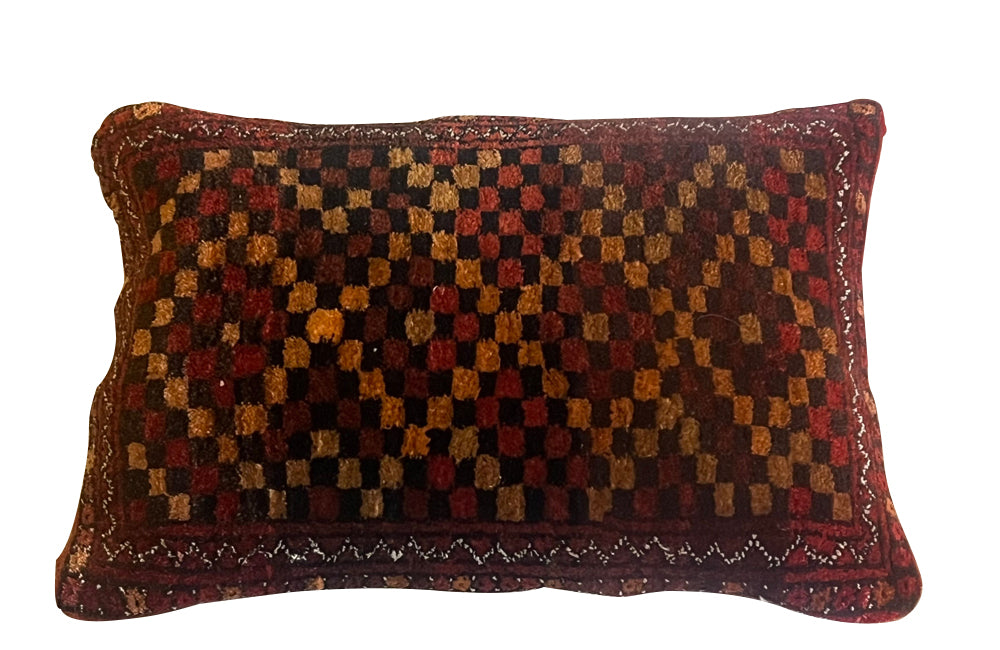 Vintage feather-filled Persian carpet cushion back with antique linen.