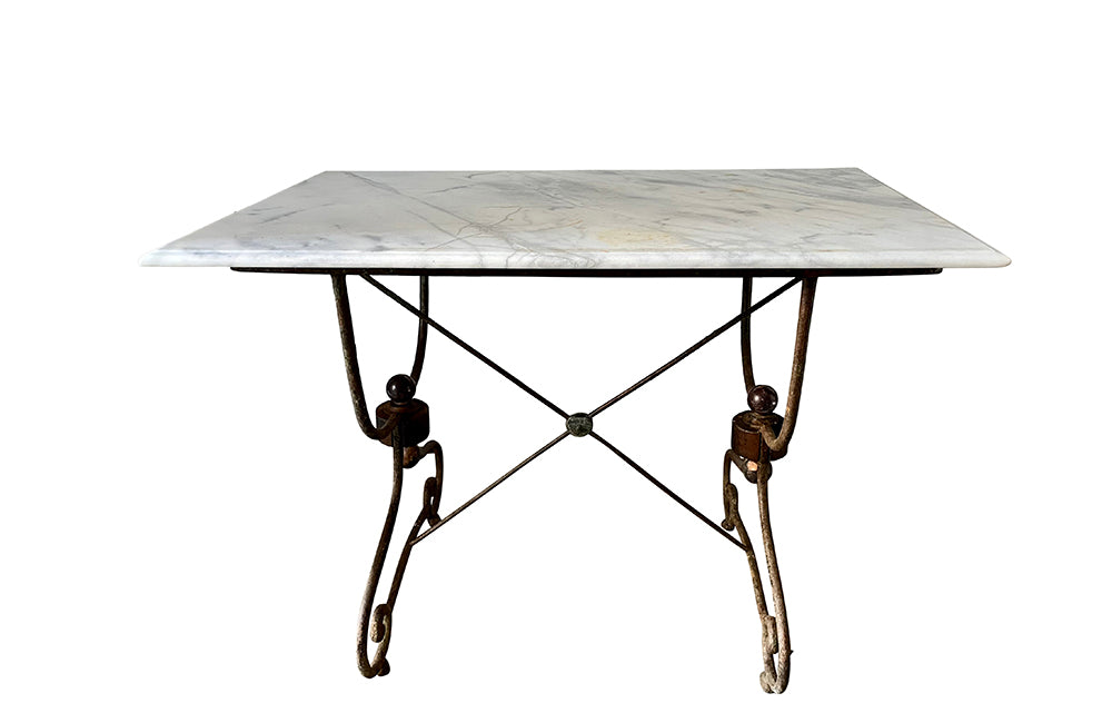 19th Century, French boucherie, or patisserie, presentation iron base table with curved legs and wooden turned blocks with brass ball finials