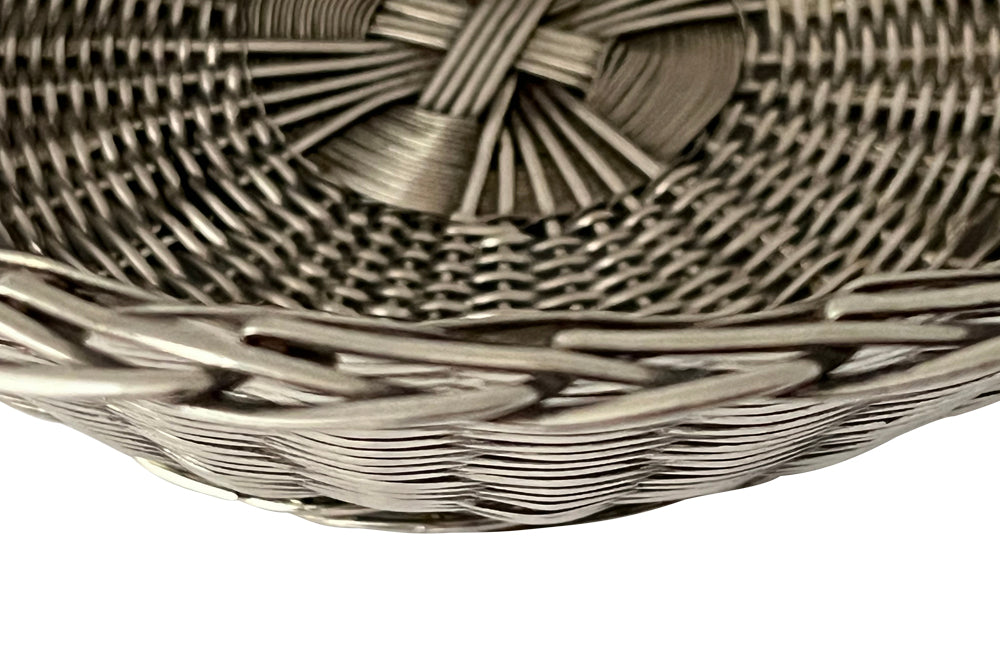 Lovely 20th Century French silver plate woven bread basket in round form.