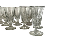 Early 20th century set of twelve French bistro glasses.
