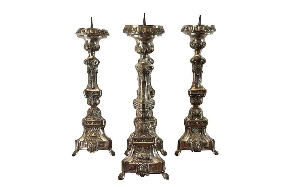 Set of four beautiful silverplate brass repoussé 19th century ecclesiastic pricket candlesticks
