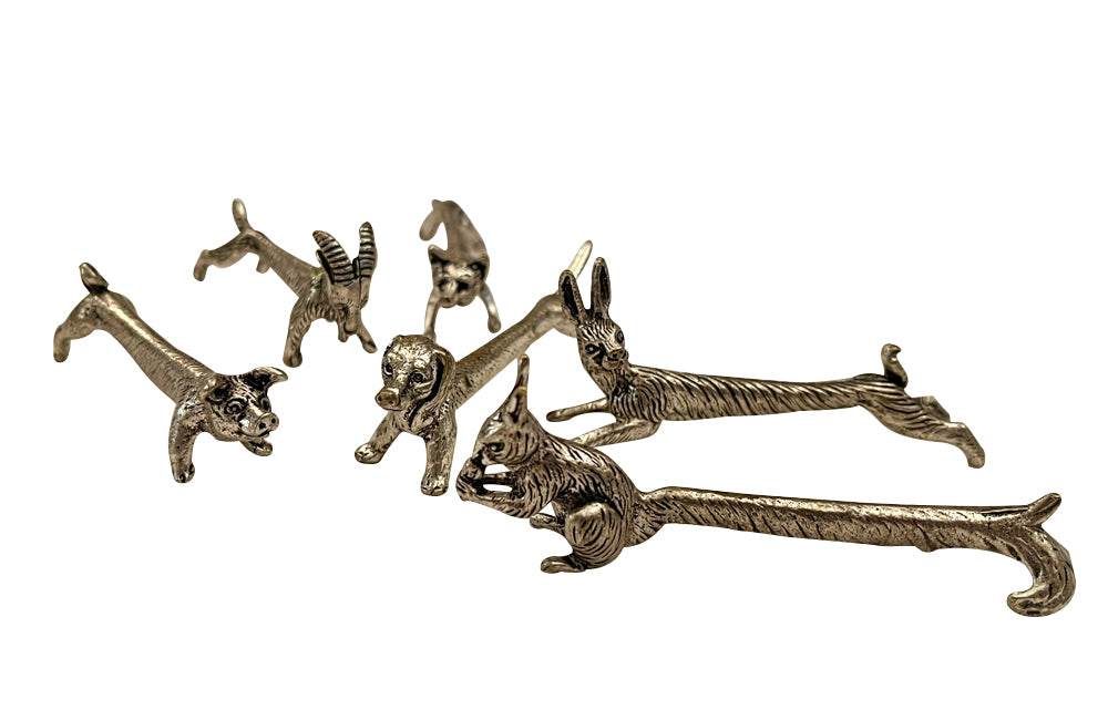 Charming set of twelve 20th Century French knife rests in the form of animals.