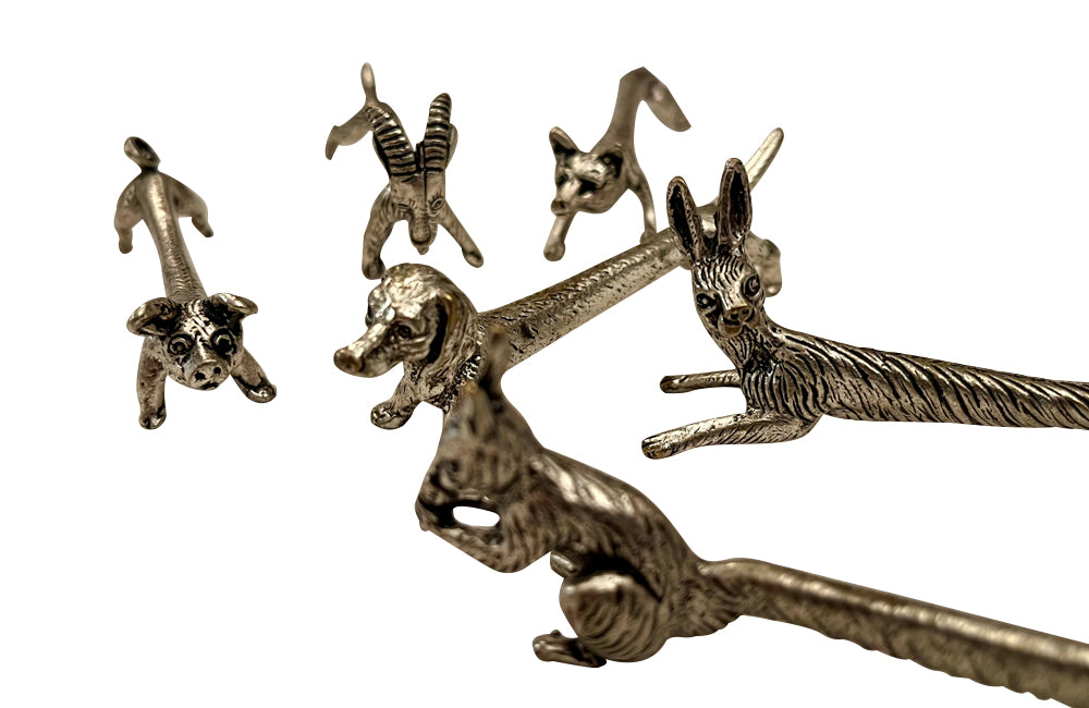 Charming set of twelve 20th Century French knife rests in the form of animals.