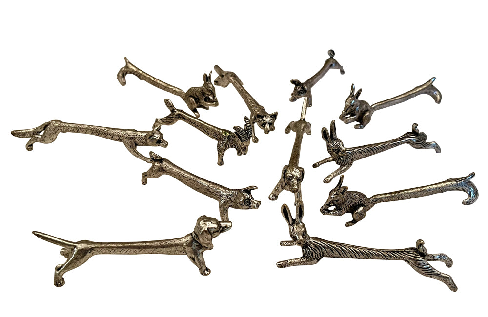 Charming set of twelve 20th Century French knife rests in the form of animals.