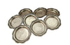 Set of eight antique French nicely worn silverplate coasters.