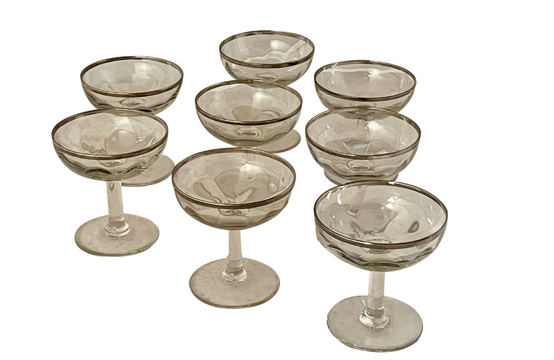 Elegant set of eight French hand blown champagne cups with silver rims circa 1920