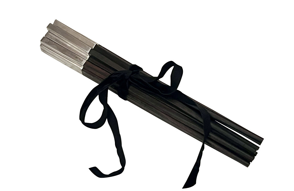 Set of sixteen silverplate and wood chopsticks by Ercuis